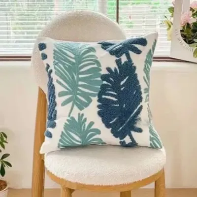 Funda de cojín bordada hojas turquesa 45×45 cm